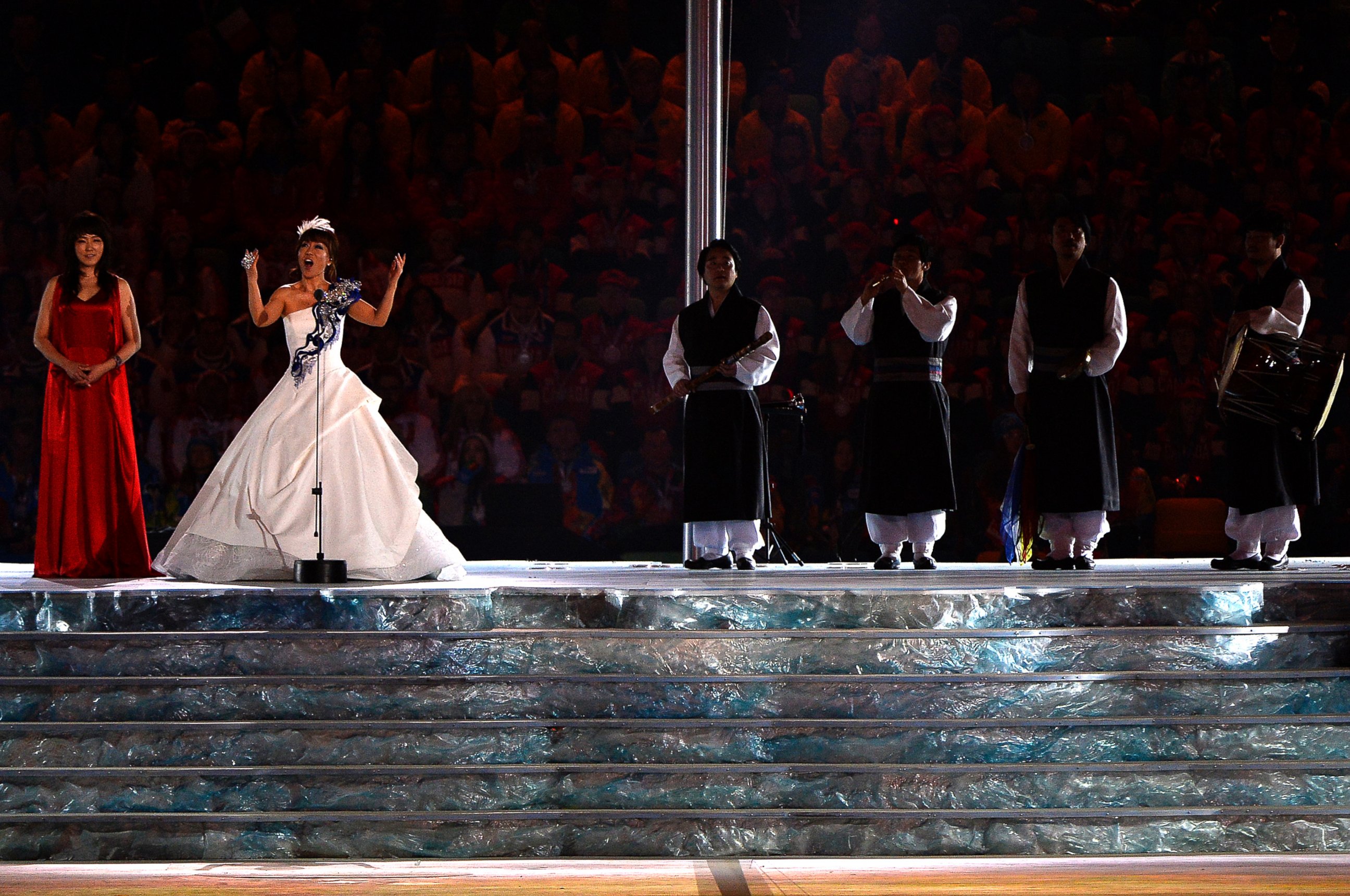 PHOTO: South Korean singer Jo Sumi (2nd L) performs during the 2014 Sochi Winter Olympics Closing Ceremony  on Feb. 23, 2014 in Sochi, Russia. 
