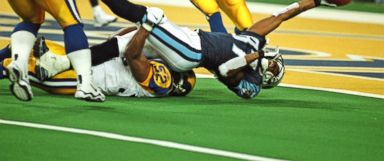 PHOTO: Tennessee Titans receiver Kevin Dyson is tackled just short of the goal line by St. Louis Rams linebacker Mike Jones on the last play of Super Bowl XXXIV at the Georgia Dome in Atlanta, GA on Jan. 30, 2000. 