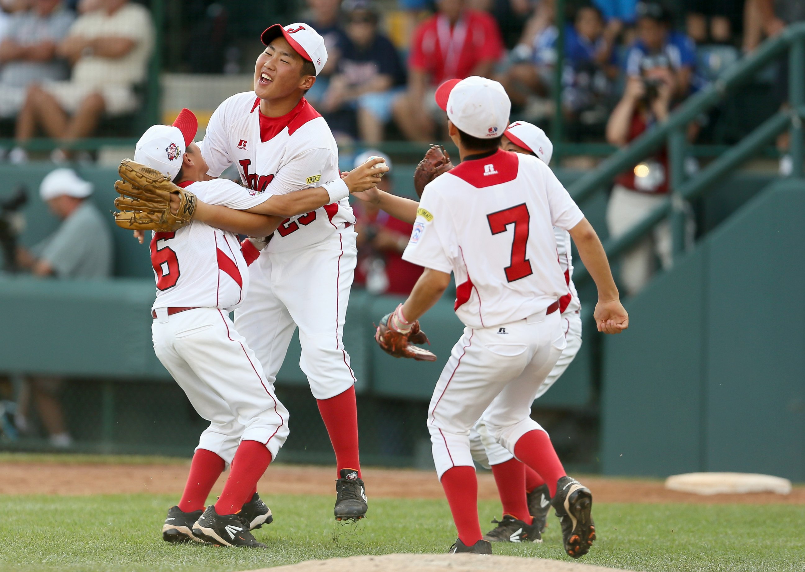 PHOTO: The Tokyo, Japan little league team celebrate after defeating the West team from Chula Vista, Ca 6-4  during the Little League World Series Championship game, Aug. 25, 2013, in Williamsport, Pa.
