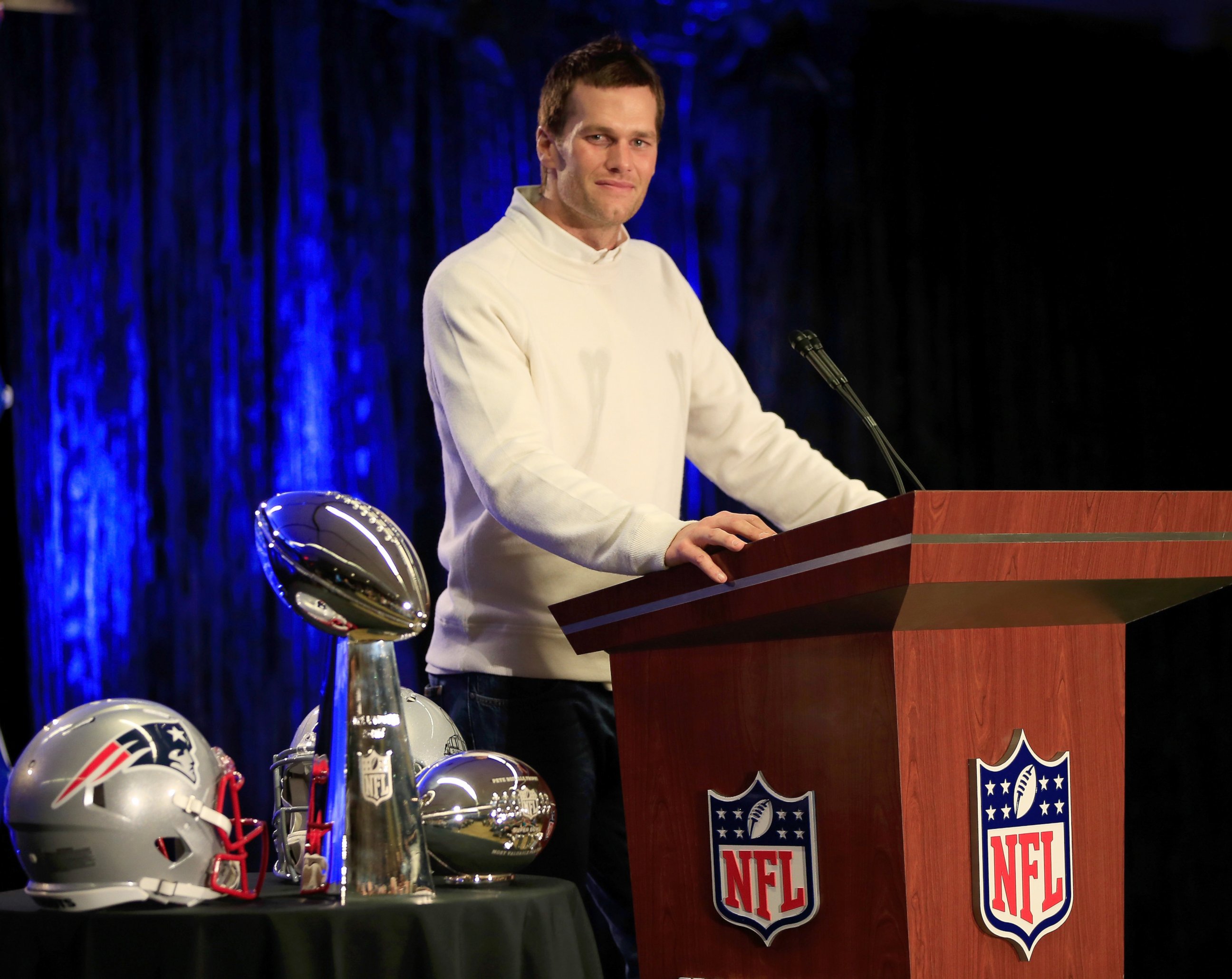 PHOTO: Tom Brady of the New England Patriots talks with the media during a Chevrolet Super Bowl XLIX MVP press conference, Feb. 2, 2015, in Phoenix.