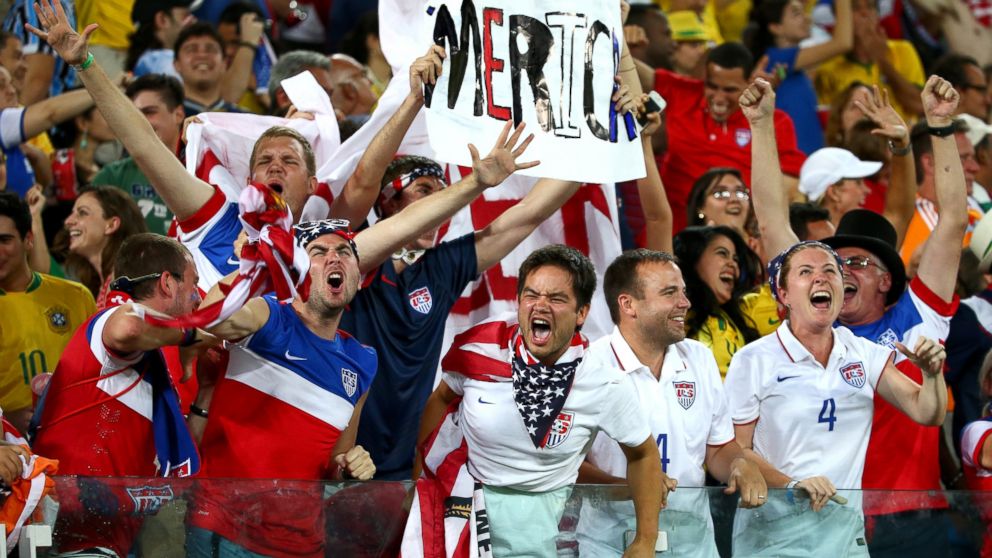 PHOTO: U.S. fans celebrate during the 2014 FIFA World Cup Brazil Group G match between Ghana and the United States at Estadio das Dunas, June 16, 2014, in Natal, Brazil.