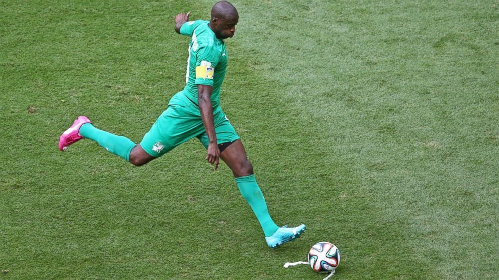 PHOTO: Yaya Toure of the Ivory Coast takes a free kick during the 2014 FIFA World Cup Brazil Group C match between Colombia and Cote D'Ivoire at Estadio Nacional on June 19, 2014 in Brasilia, Brazil. 