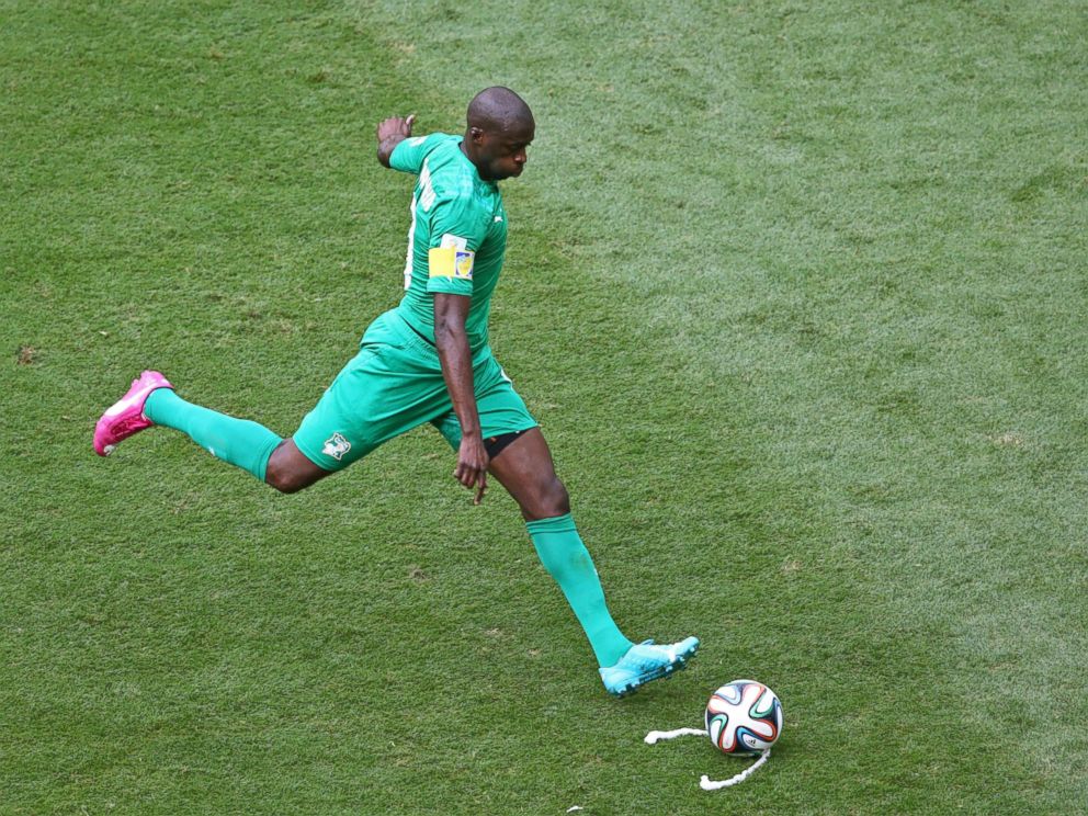 PHOTO: Yaya Toure of the Ivory Coast takes a free kick during the 2014 FIFA World Cup Brazil Group C match between Colombia and Cote DIvoire at Estadio Nacional on June 19, 2014 in Brasilia, Brazil.