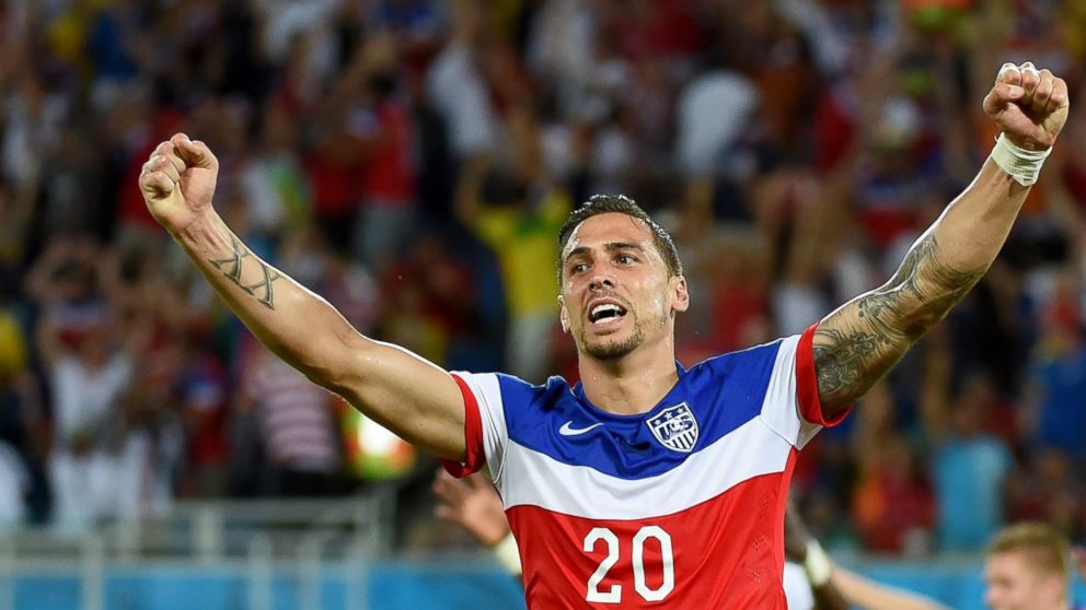 PHOTO: US defender Geoff Cameron celebrates after US defender John Brooks scored during a Group G football match between Ghana and US at the Dunas Arena in Natal during the 2014 FIFA World Cup, June 16, 2014.