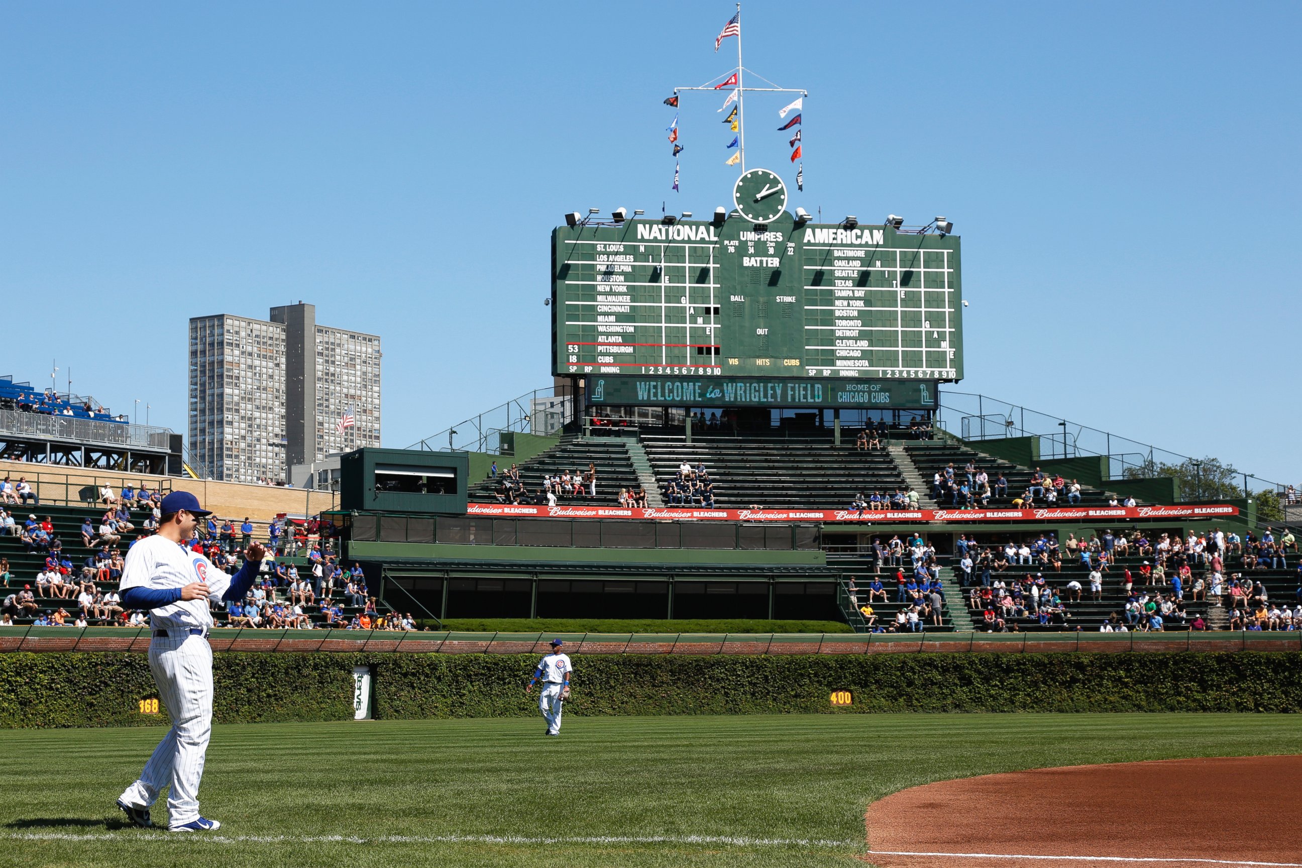 PHOTO: Players warm up before a game at Wrigley Field