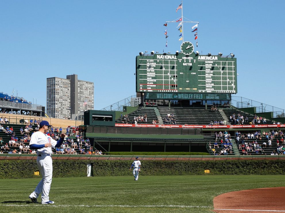 PHOTO: Players warm up before a game at Wrigley Field