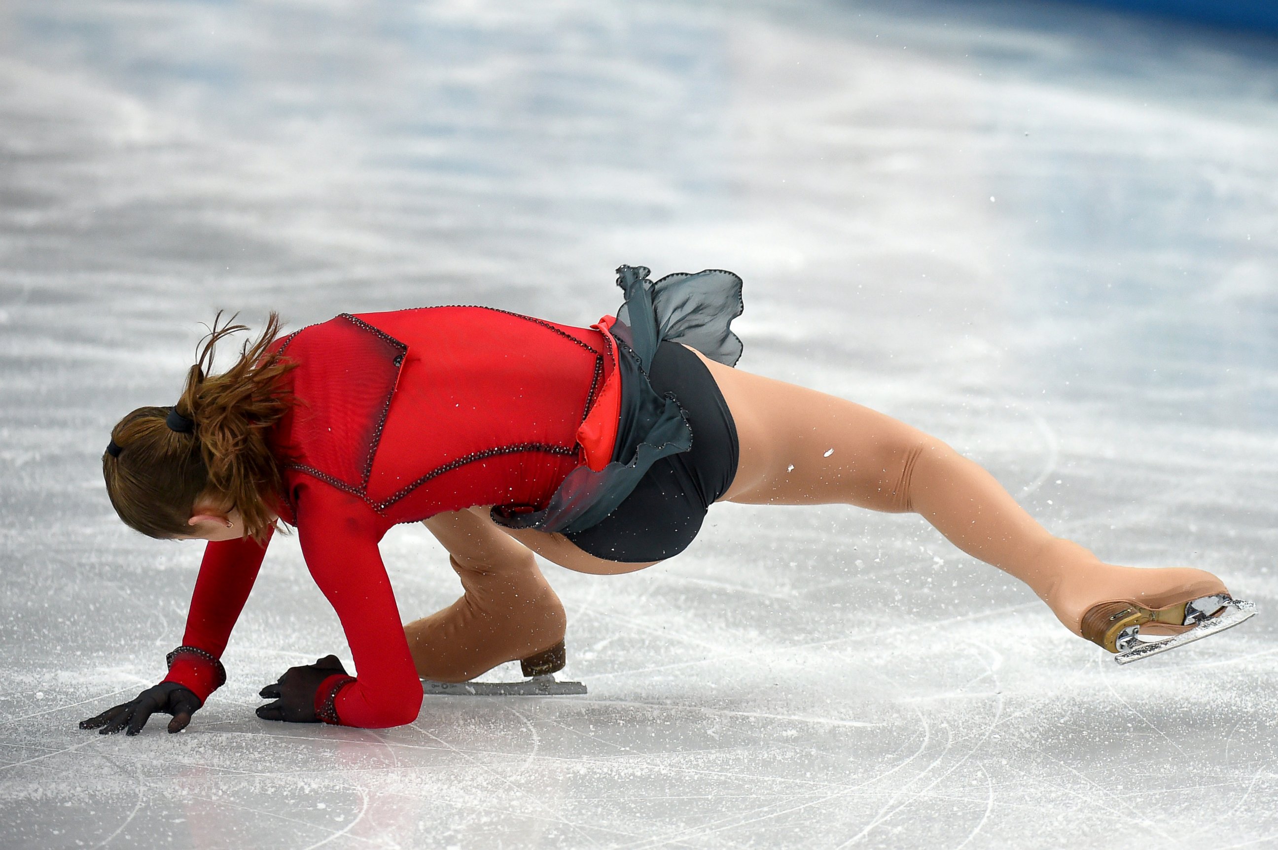 PHOTO: Russia's Julia Lipnitskaia falls in the women's figure skating free program at the Iceberg Skating Palace during the 2014 Sochi Winter Olympics, Feb. 20, 2014, in Sochi, Russia.