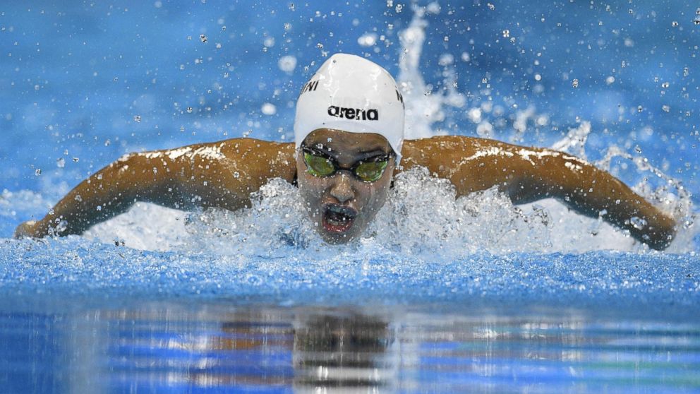 Syrian Refugee Swimmer Yusra Mardini Wins First Heat of 100M