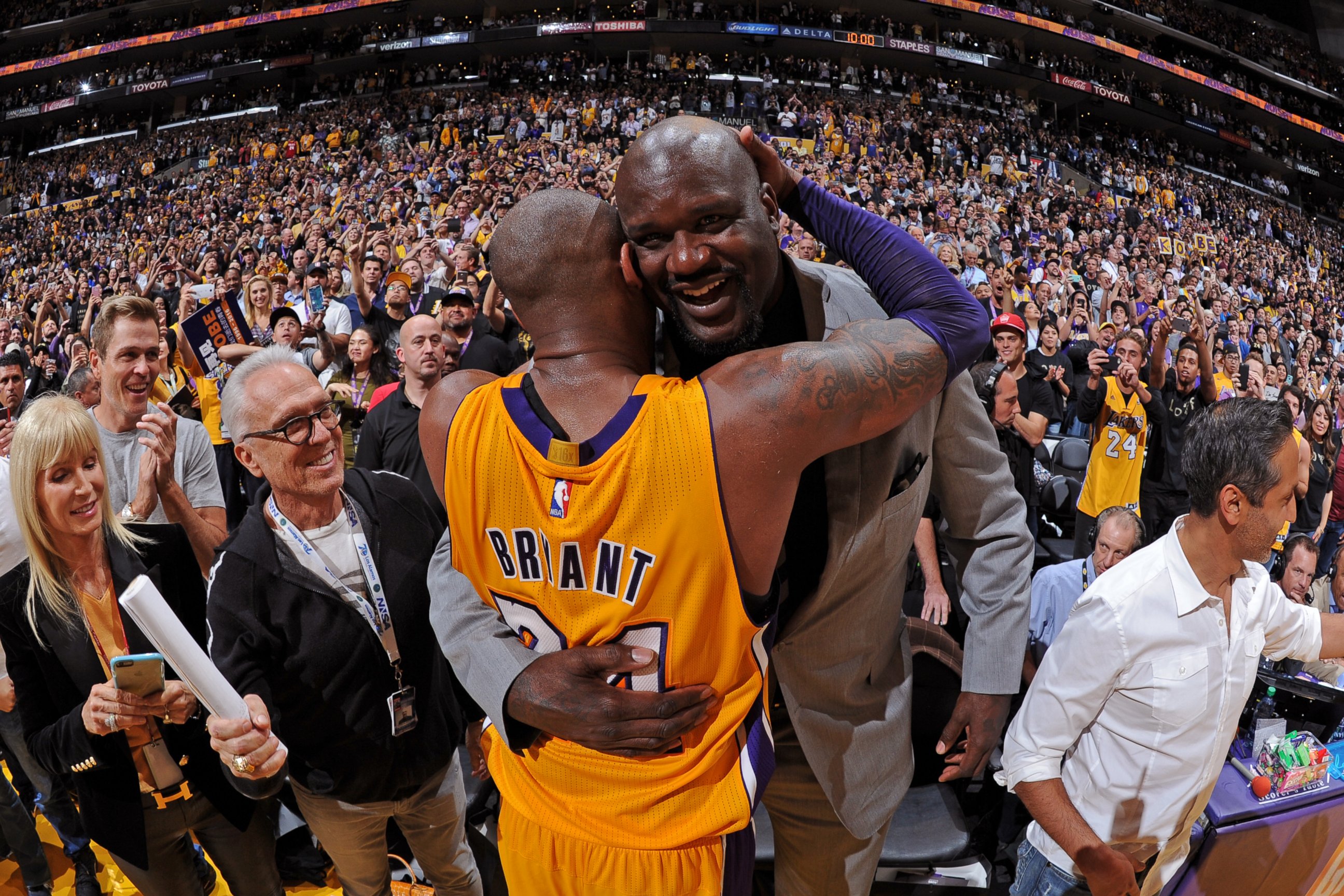 PHOTO: NBA Legend, Shaquille O'Neal and Kobe Bryant #24 of the Los Angeles Lakers hug after Bryant's final game, April 13, 2016, at Staples Center in Los Angeles, California. 