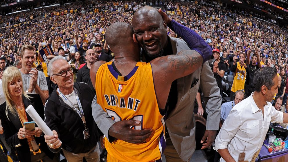 PHOTO: NBA Legend, Shaquille O'Neal and Kobe Bryant #24 of the Los Angeles Lakers hug after Bryant's final game, April 13, 2016, at Staples Center in Los Angeles, California. 