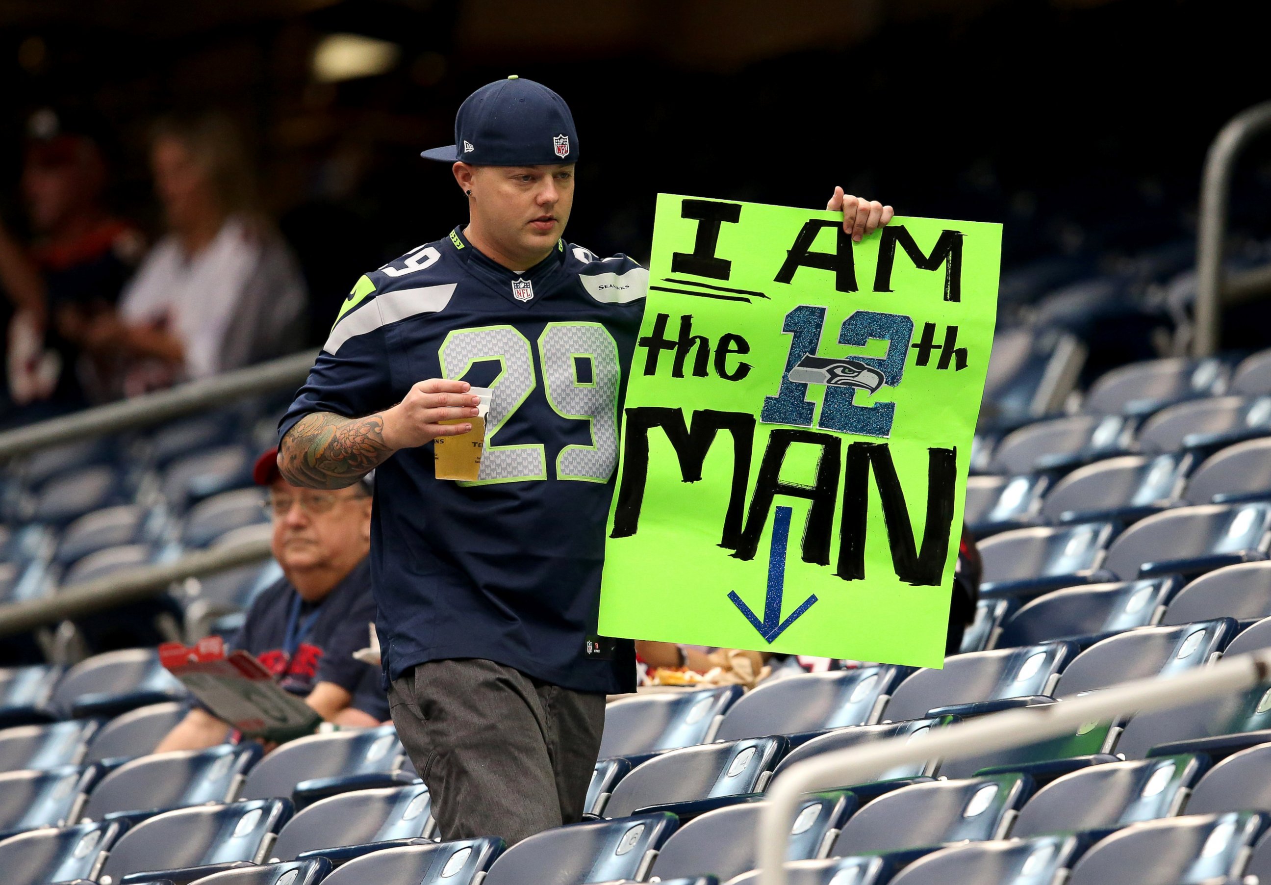 PHOTO: Seattle Seahawks fan displays his 12th man sign prior to the game against the Houston Texans at Reliant Stadium, Sept. 29, 2013, in Houston.