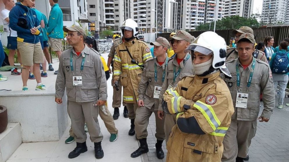 Firefighters respond to a small fire that broke out in the Australian Olympic team's quarters in the Olympic Village in Rio de Janeiro, Brazil, on July 29, 2016.