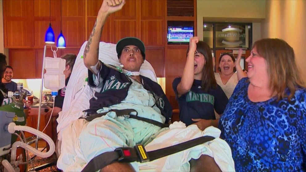 PHOTO: Mike Jackson, 32, is pictured cheering for the Seattle Mariners during a game on July 7, 2015. 
