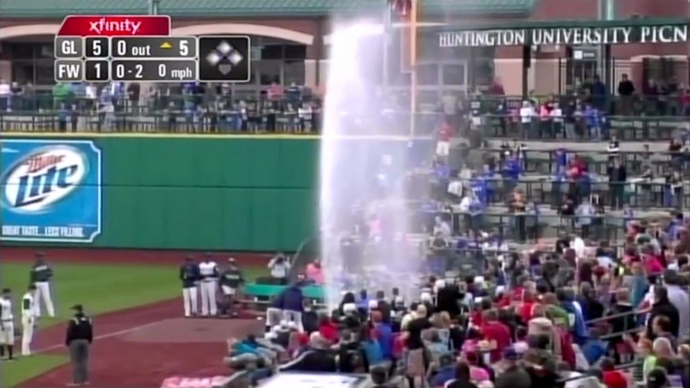 PHOTO: A geyser-like condition halted a TinCaps game when a player ran into a sprinkler.