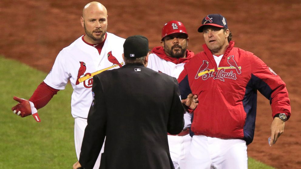 Mike Matheny of the St. Louis Cardinals argues a call with home plate umpire, Paul Emmel, during Game Four of the 2013 World Series against the Boston Red Sox at Busch Stadium in St. Louis, Oct. 27, 2013.