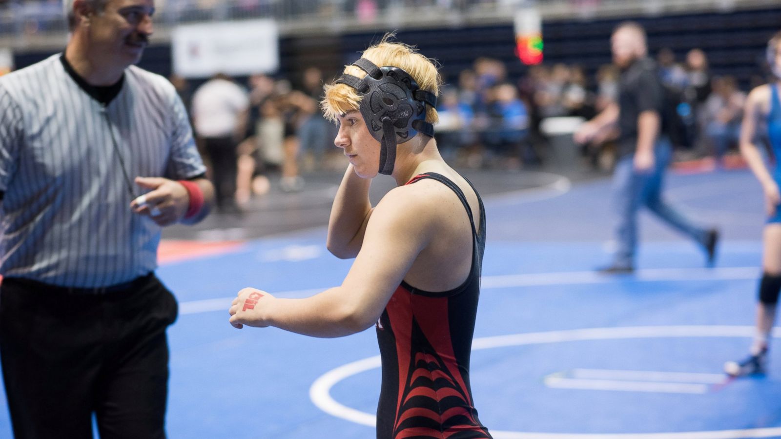 Transgender teen wrestler whos used to winning on mat now has a bigger, though partial, victory picture