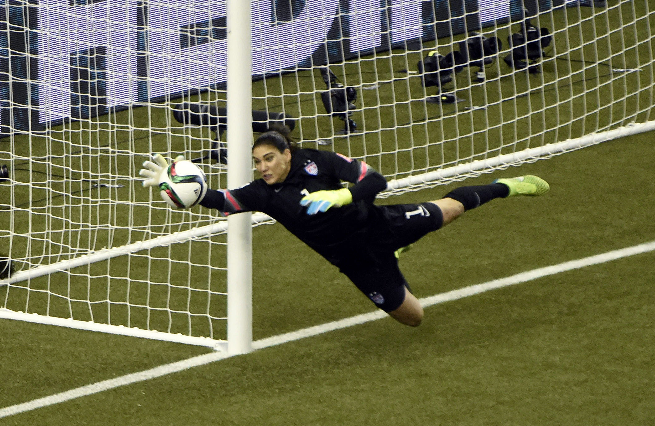 PHOTO: United States goalkeeper Hope Solo, No.1, makes a save against Germany during the semifinals of the FIFA 2015 Women's World Cup, June 30, 2015, at Olympic Stadium in Montreal. 