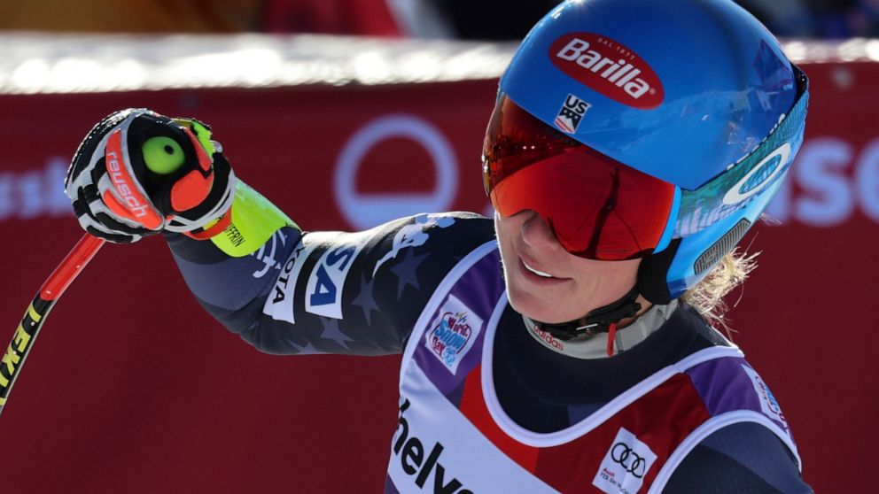 United States' Mikaela Shiffrin reacts after crossing the finish line to complete an alpine ski, women's World Cup Super-G race, in St. Moritz, Switzerland, Sunday, Dec. 18, 2022. (AP Photo/Marco Trovati)