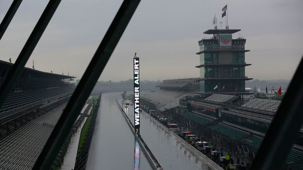 A weather alert is posted on the scoring pylon as severe weather moved through the area before the start of practice for the Indianapolis 500 IndyCar auto race at Indianapolis Motor Speedway, Friday, May 24, 2019, in Indianapolis. (AP Photo/R Brent Smith)