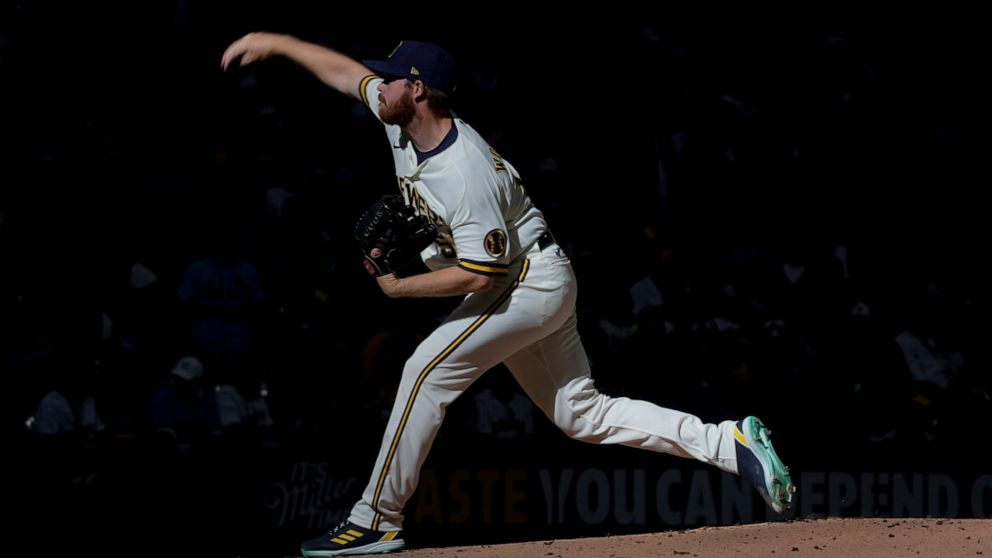 Milwaukee Brewers relief pitcher Brandon Woodruff throws during the second inning of a baseball game against the St. Louis Cardinals Thursday, April 14, 2022, in Milwaukee. (AP Photo/Morry Gash)