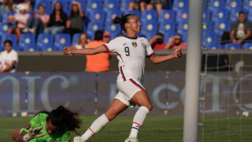 United States' Mallory Pugh celebrates scoring her side's 2nd goal against Costa Rica during a CONCACAF Women's Championship soccer semifinal match in Monterrey, Mexico, Thursday, July 14, 2022. (AP Photo/Fernando Llano)