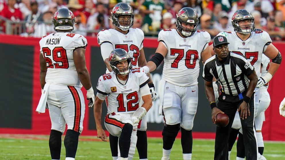 Tampa Bay Buccaneers' Tom Brady gets up after being sacked during the second half of an NFL football game against the Green Bay Packers Sunday, Sept. 25, 2022, in Tampa, Fla. (AP Photo/Chris O'Meara)