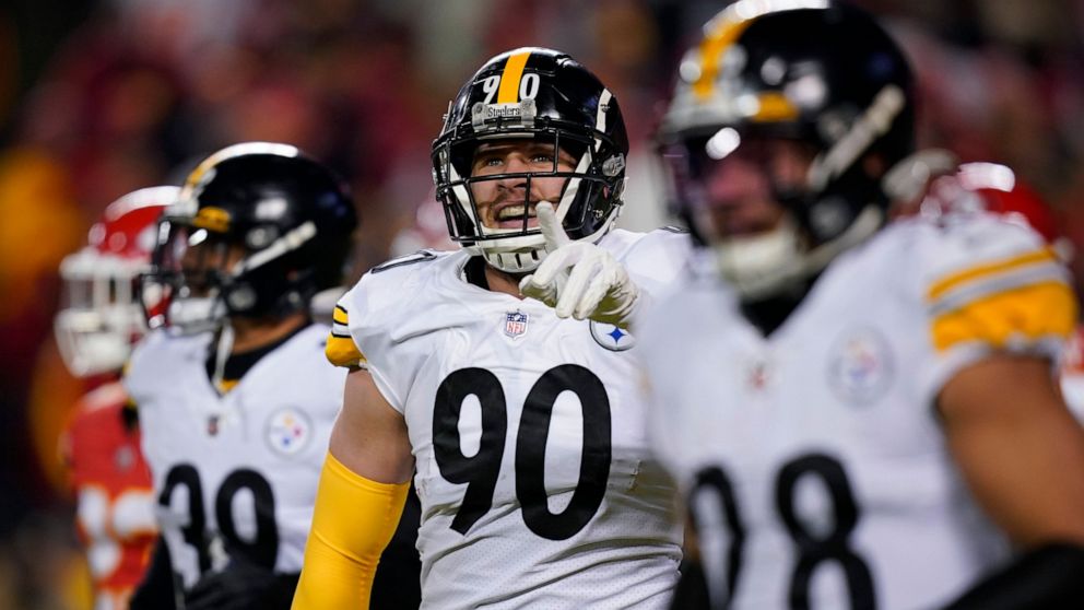 Pittsburgh Steelers outside linebacker T.J. Watt (90) celebrates after returning a fumble for a touchdown during the first half of an NFL wild-card playoff football game against the Kansas City Chiefs, Sunday, Jan. 16, 2022, in Kansas City, Mo. (AP P