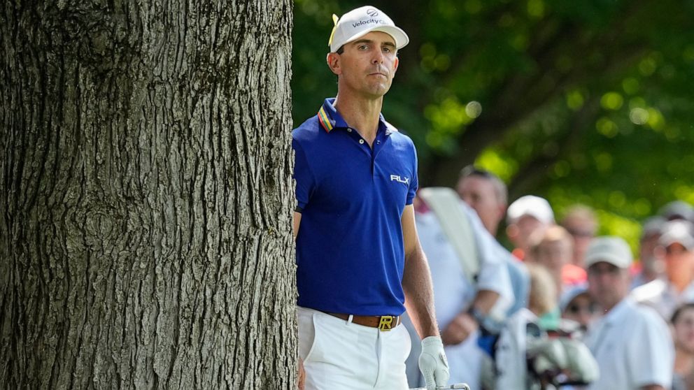 Billy Horschel looks over his shot from the rough on the 13th hole during the final round of the Memorial golf tournament Sunday, June 5, 2022, in Dublin, Ohio. (AP Photo/Darron Cummings)