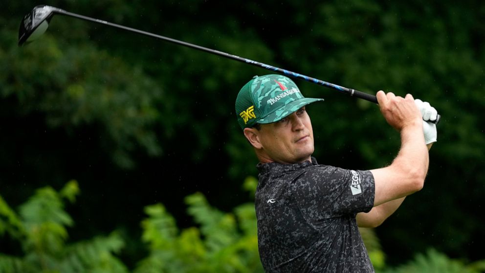 Zach Johnson hits off the second tee during the final round of the John Deere Classic golf tournament, Sunday, July 11, 2021, at TPC Deere Run in Silvis, Ill. (AP Photo/Charlie Neibergall)