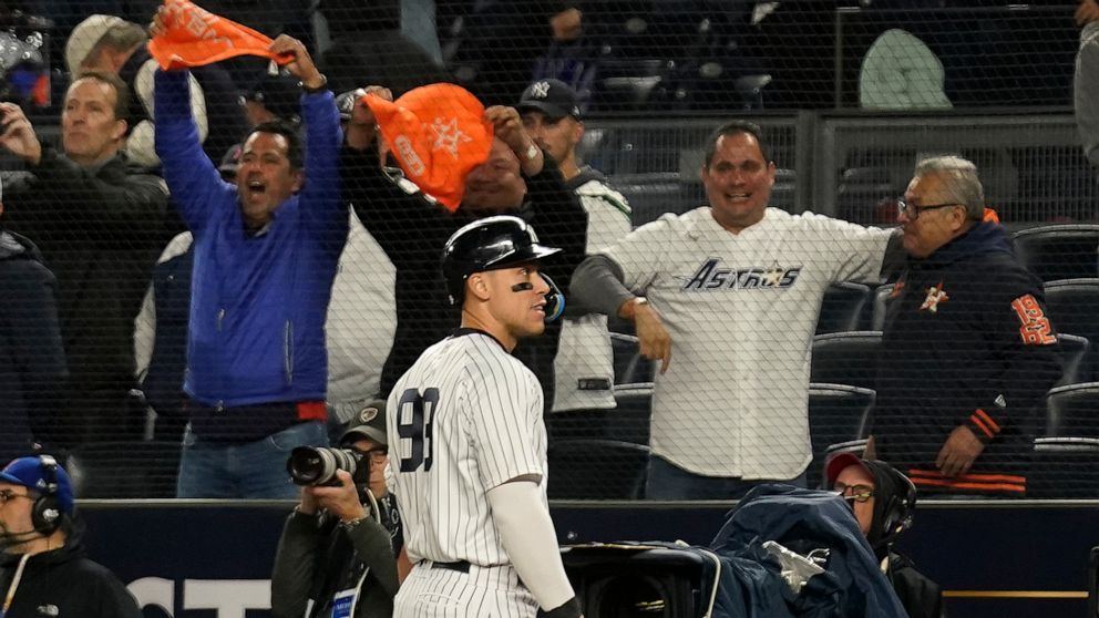 New York Yankees right fielder Aaron Judge (99) walks off the field after grounding out to the Houston Astros to end Game 4 of an American League Championship baseball series, Monday, Oct. 24, 2022, in New York. (AP Photo/Seth Wenig)