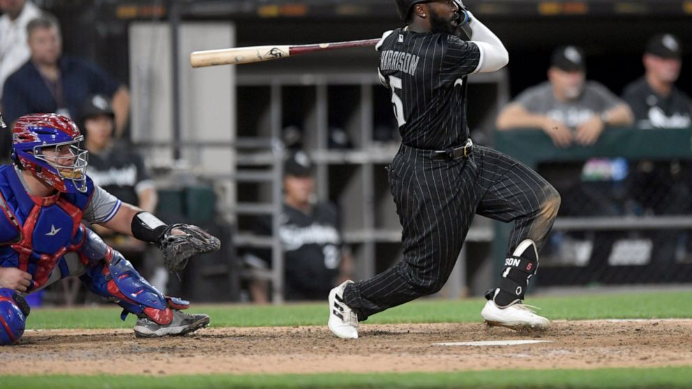 Chicago White Sox's Josh Harrison watches his walk-off RBI single to defeat the Toronto Blue Jays 7-6 in twelve innings of a baseball game Tuesday, June 21, 2022, in Chicago. (AP Photo/Paul Beaty)