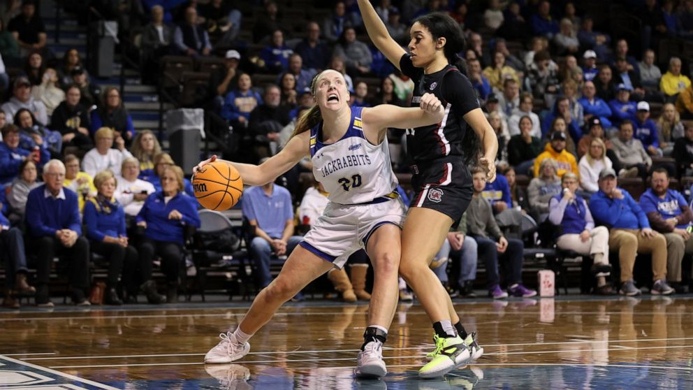 South Dakota State guard Tori Nelson (2) drives the hoop against South Carolina during NCAA college basketball game in Sioux Fall, S.D., on Thursday, Dec 15, 2022. (AP Photo/Josh Jurgens)