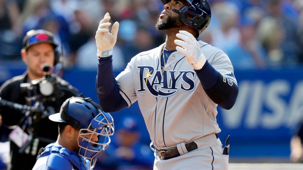 Tampa Bay Rays' Yandy Diaz reacts after hitting a three run home-run during the second inning of a baseball game against the Toronto Blue Jays in Toronto, Thursday, Sept. 15, 2022. (Frank Gunn/The Canadian Press via AP)