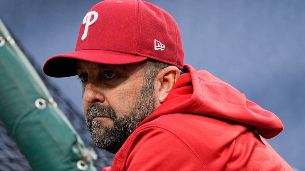 Philadelphia Phillies hitting coach Kevin Long watches during batting practice before Game 4 of baseball's World Series between the Houston Astros and the Philadelphia Phillies on Wednesday, Nov. 2, 2022, in Philadelphia. (AP Photo/David J. Phillip)