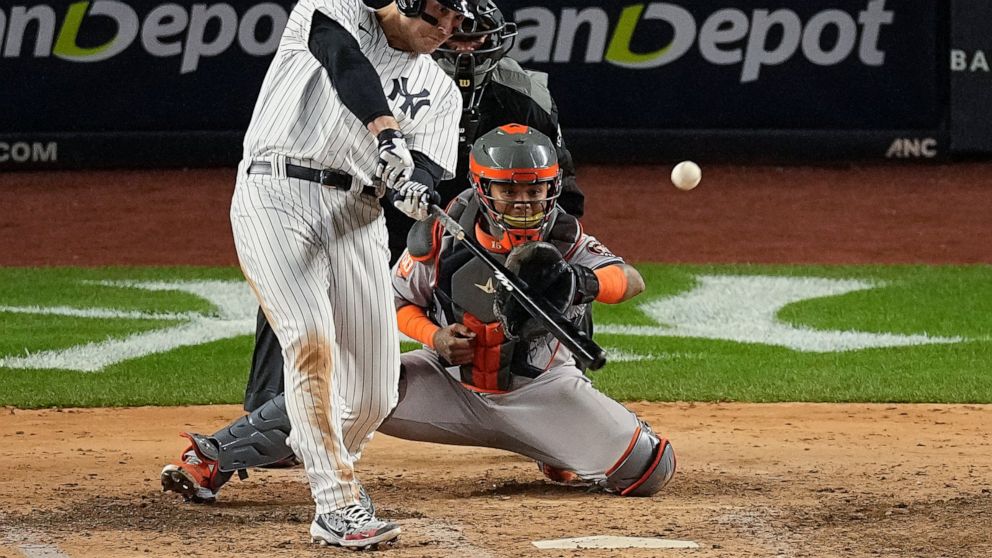 New York Yankees Anthony Rizzo connects for an RBI base hit against the Houston Astros during the fourth inning of Game 4 of an American League Championship baseball series, Sunday, Oct. 23, 2022, in New York. (AP Photo/Julia Nikhinson)