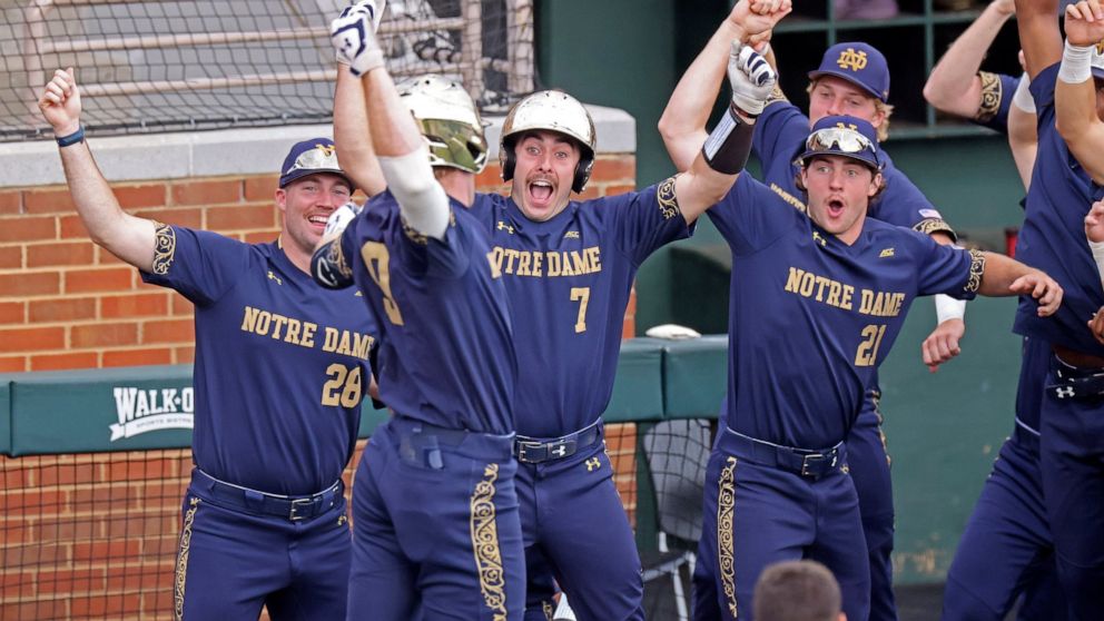 Notre Dame's John Michael Bertrand (28), Jack Zyska (7) and Brady Gumpf (21) celebrate after a home run by Jack Brannigan (9) against Tennessee in the fourth inning during an NCAA college baseball super regional game Friday, June 10, 2022, in Knoxvil