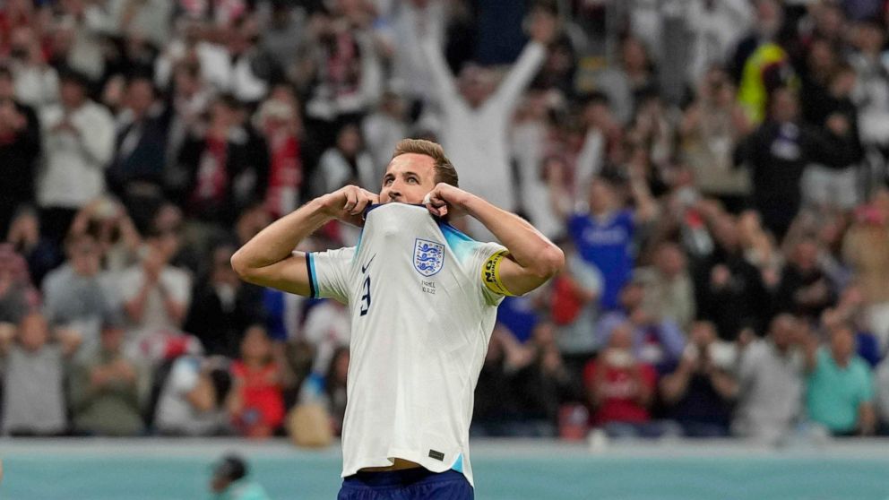 England's Harry Kane reacts after he missed a penalty kick during the World Cup quarterfinal soccer match between England and France, at the Al Bayt Stadium in Al Khor, Qatar, Saturday, Dec. 10, 2022. (AP Photo/Frank Augstein)
