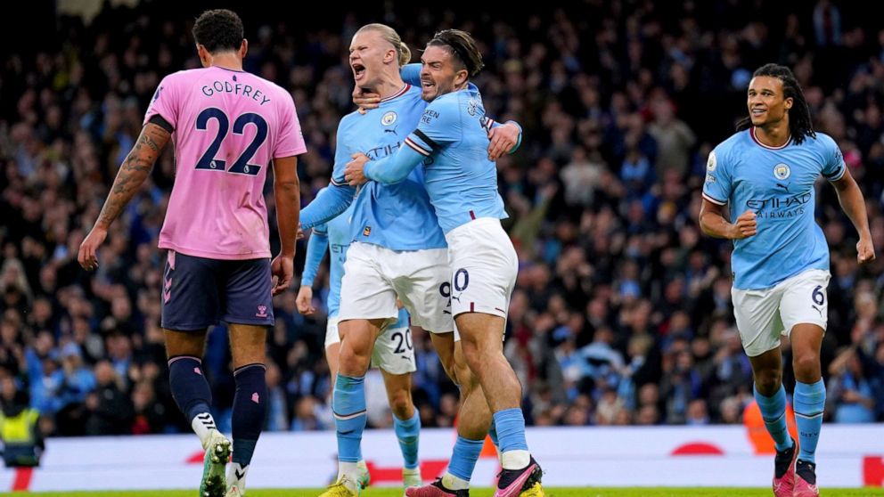 Manchester City's Erling Haaland, centre, celebrates after scoring the opening goal during the English Premier League soccer match between Manchester City and Everton at the Etihad Stadium in Manchester, England, Saturday, Dec. 31, 2022. (Tim Goode/P