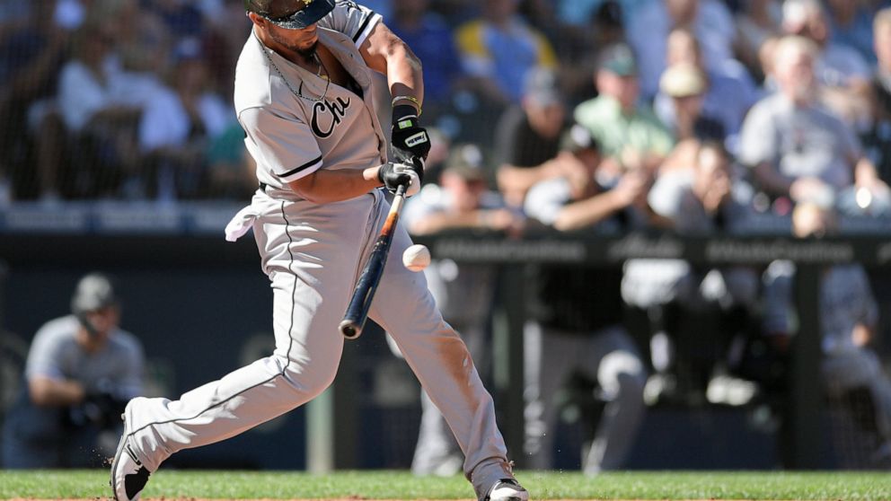 Chicago White Sox's Jose Abreu hits an RBI single against the Seattle Mariners during the sixth inning of a baseball game Wednesday, Sept. 7, 2022, in Seattle. (AP Photo/Caean Couto)