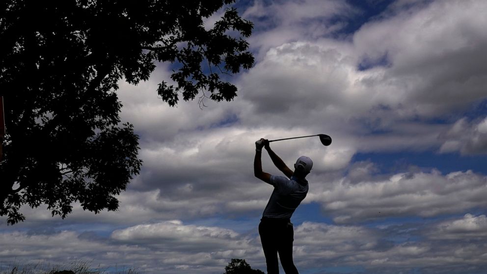 Will Zalatoris watches his shot on the fourth hole during the third round of the U.S. Open golf tournament at The Country Club, Saturday, June 18, 2022, in Brookline, Mass. (AP Photo/Charlie Riedel)