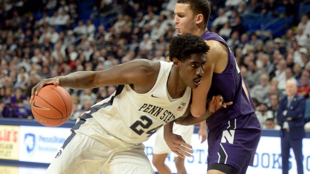 Penn State's Mike Watkins (24) makes a move to the basket against Northwestern's Pete Nance, right, during the second half of an NCAA college basketball game, Saturday, Feb. 15, 2020, in State College, Pa. (AP Photo/Gary M. Baranec)