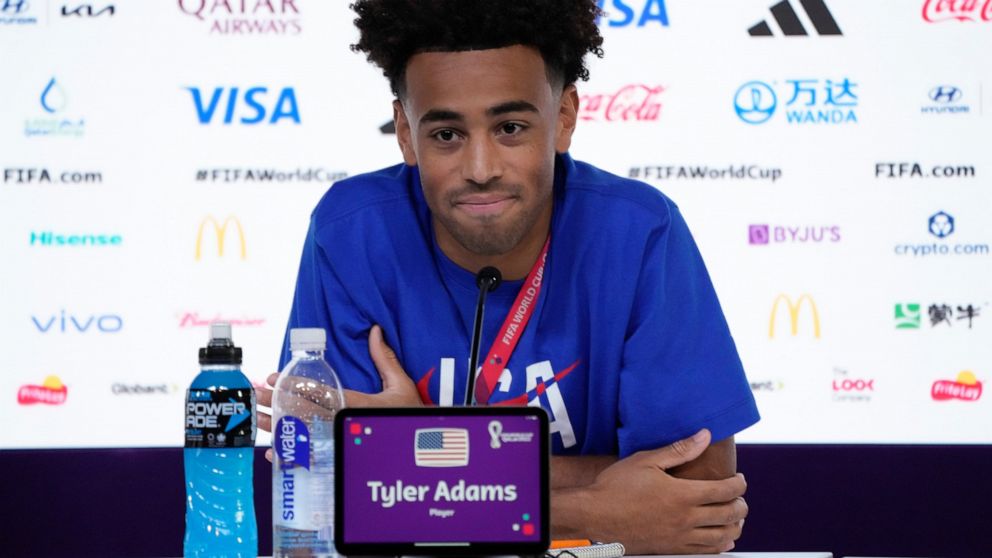Tyler Adams of the United States attends a press conference on the eve of the group B World Cup soccer match between England and the United States, in Doha, Qatar, Thursday, Nov. 24, 2022. (AP Photo/Ashley Landis)
