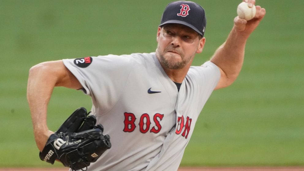 Boston Red Sox starting pitcher Rich Hill delivers against the Pittsburgh Pirates during the first inning of a baseball game Wednesday, Aug. 17, 2022, in Pittsburgh. (AP Photo/Keith Srakocic)