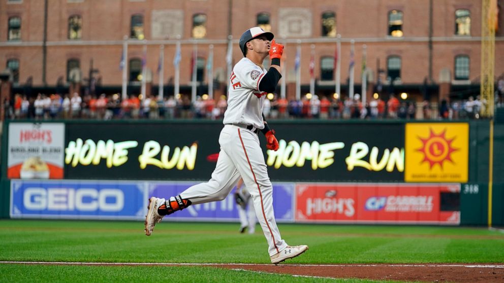 Baltimore Orioles' Ryan Mountcastle gestures while running the bases after hitting a three-run home run off Chicago White Sox starting pitcher Dylan Cease during the first inning of a baseball game, Tuesday, Aug. 23, 2022, in Baltimore. Orioles' Cedr