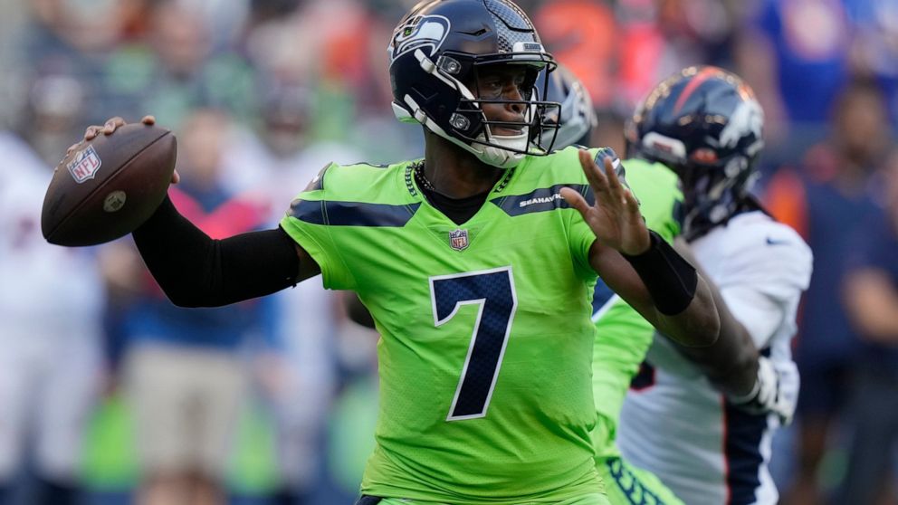 Seattle Seahawks quarterback Geno Smith passes against the Denver Broncos during the first half of an NFL football game, Monday, Sept. 12, 2022, in Seattle. (AP Photo/Stephen Brashear)
