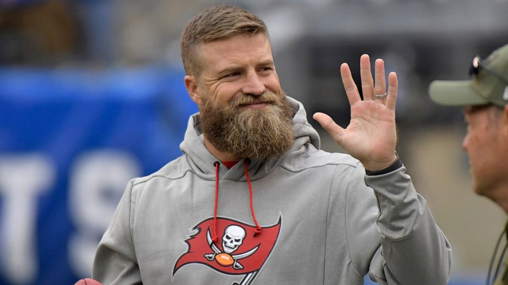 FILE - Tampa Bay Buccaneers quarterback Ryan Fitzpatrick waves to fans before an NFL football game against the New York Giants, Sunday, Nov. 18, 2018, in East Rutherford, N.J. Quarterback Ryan Fitzpatrick confirmed to The Associated Press on Friday, 
