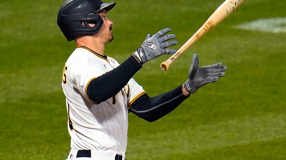 Pittsburgh Pirates' Bryan Reynolds lets go of his bat after swinging at a pitch from Washington Nationals relief pitcher Andres Machado during the sixth inning of a baseball game in Pittsburgh, Thursday, April 14, 2022. (AP Photo/Gene J. Puskar)