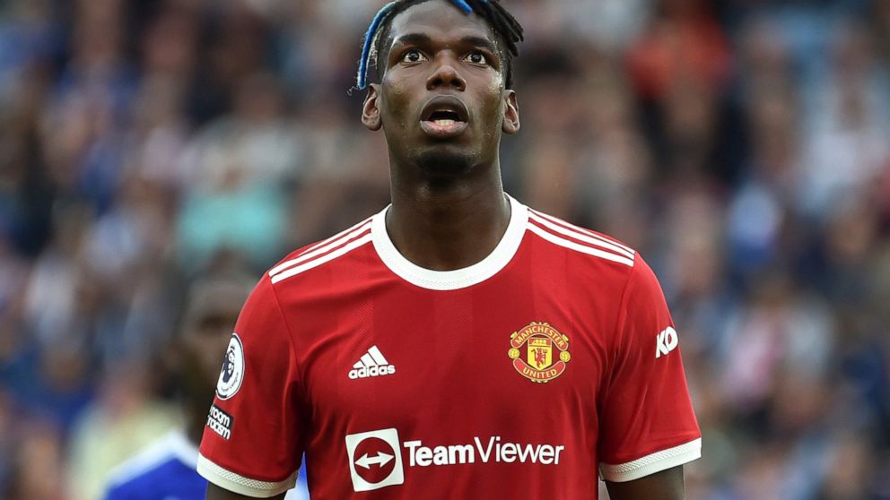 FILE - Manchester United's Paul Pogba looks up during the English Premier League soccer match between Leicester City and Manchester United at King Power stadium in Leicester, England, Saturday, Oct. 16, 2021. French prosecutors are investigating alle