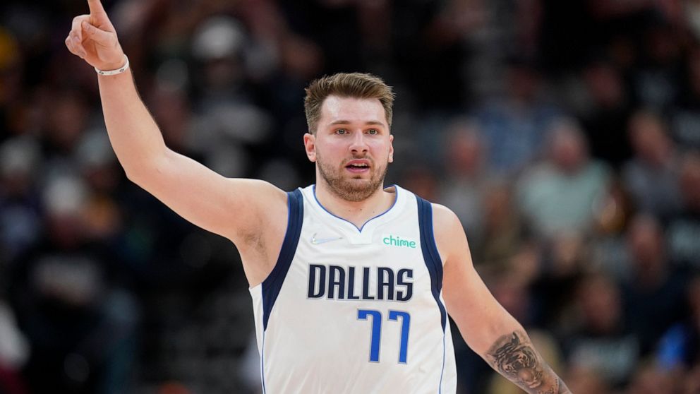 Dallas Mavericks guard Luka Doncic (77) gestures in the second half of Game 6 of an NBA basketball first-round playoff series against the Utah Jazz, Thursday, April 28, 2022, in Salt Lake City. (AP Photo/Rick Bowmer)