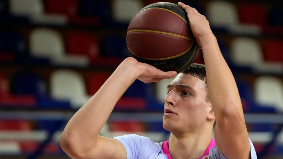 FILE - Mega's Nikola Jovic tries to score during the ABA League basketball match between FMP and Mega in Belgrade, Serbia, Saturday, Jan. 29, 2022. Jovic, of Serbia, is one of the top international prospects heading into this year's NBA draft. (AP Ph